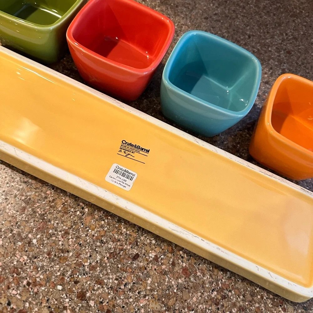 Crate & Barrel serving bowls on platters